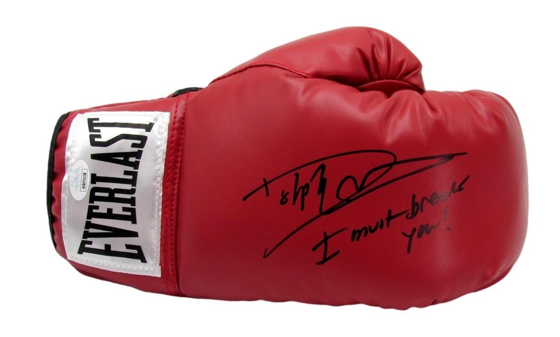 Dolph Lundgren Autographed Boxing Glove Balboa vs Drago JSA Certified: Dolph Lundgren Autographed Boxing Glove Balboa vs Drago JSA Certified This is a pre-owned right boxing glove autographed and inscribed by Dolph Lundgren, featuring the iconic quote "I must break you!"