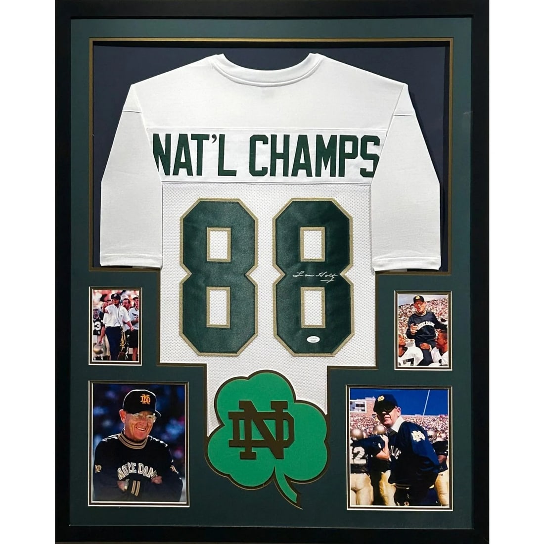Framed Lou Holtz Autographed Notre Dame Jersey JSA 1988: Framed Lou Holtz Autographed Notre Dame Jersey JSA 1988 Framed autographed Lou Holtz jersey commemorating Notre Dame 1988. The piece is JSA authenticated and includes a tamper-proof sticker. It is pre