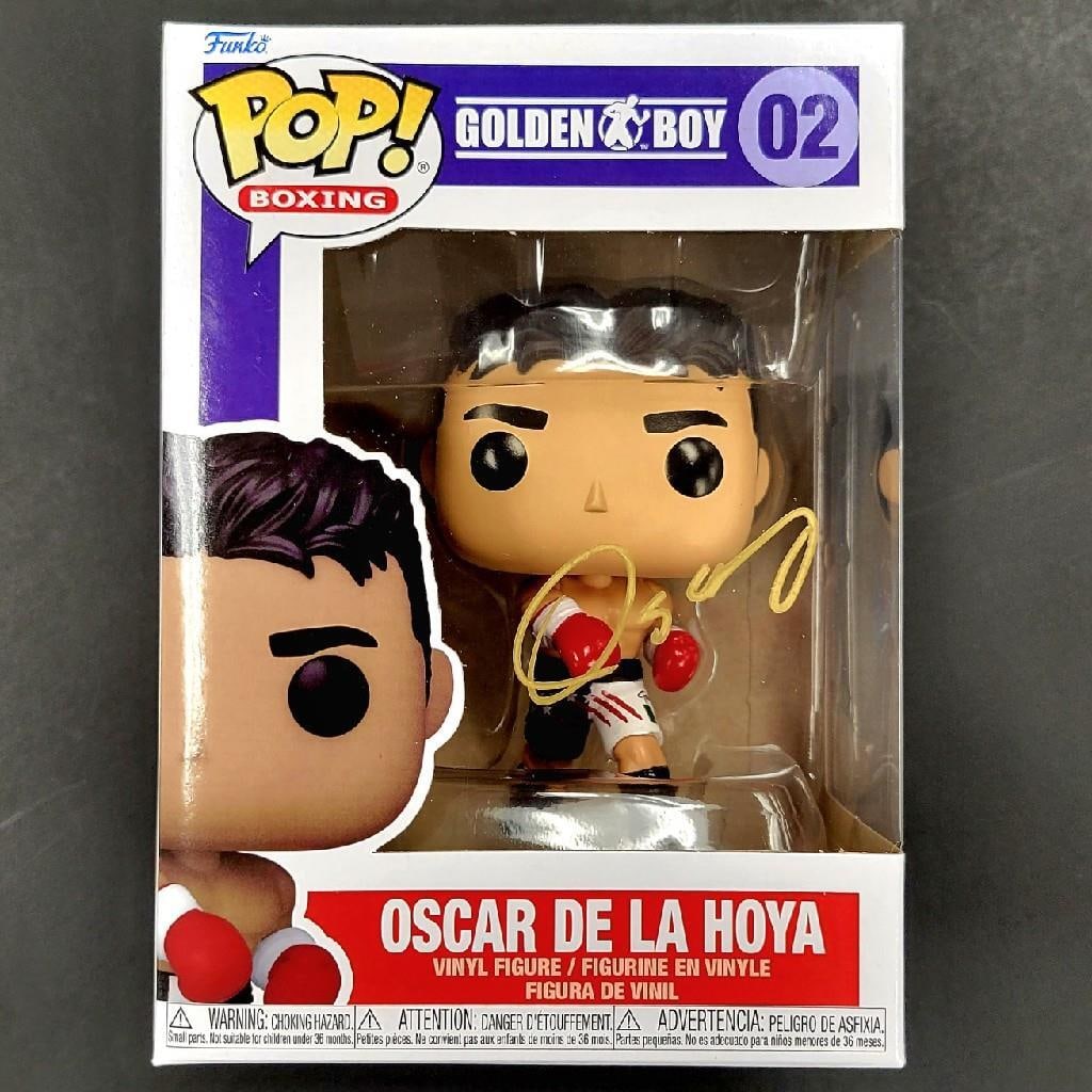 Oscar De La Hoya Golden Boy Funko Pop BAS Holo Signed: Oscar De La Hoya Golden Boy Funko Pop BAS Holo Signed This is an original Funko Pop collectible featuring Oscar De La Hoya, signed with a gold autograph. The autograph has been authenticated by Becket