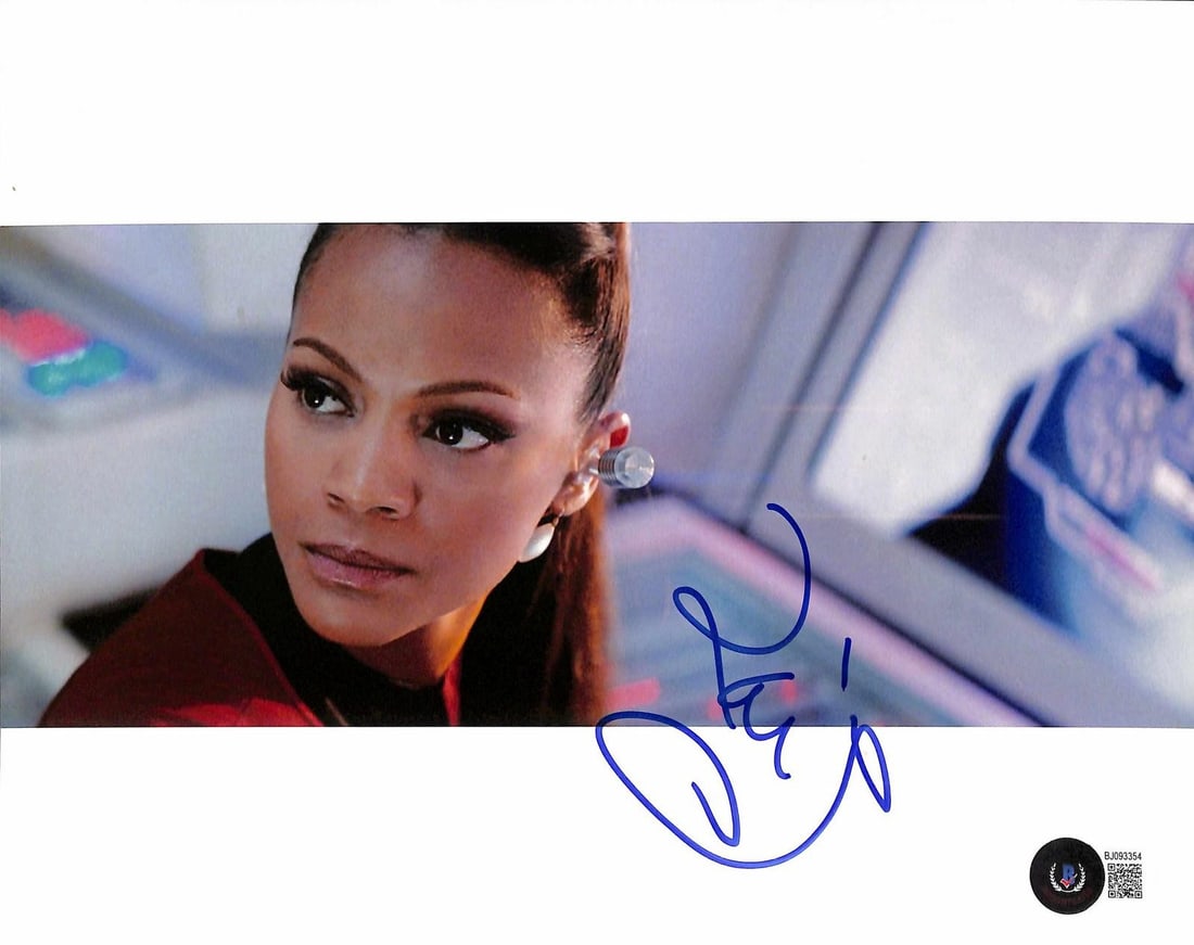 Beckett Authenticated Zoe Saldana Uhura 8x10 Signed Star Trek Photo: Beckett Authenticated Zoe Saldana Uhura 8x10 Signed Star Trek Photo Pre-owned signed 8x10 photograph of Zoe Saldana as Uhura from the Star Trek film series. The image shows Saldana in character on the