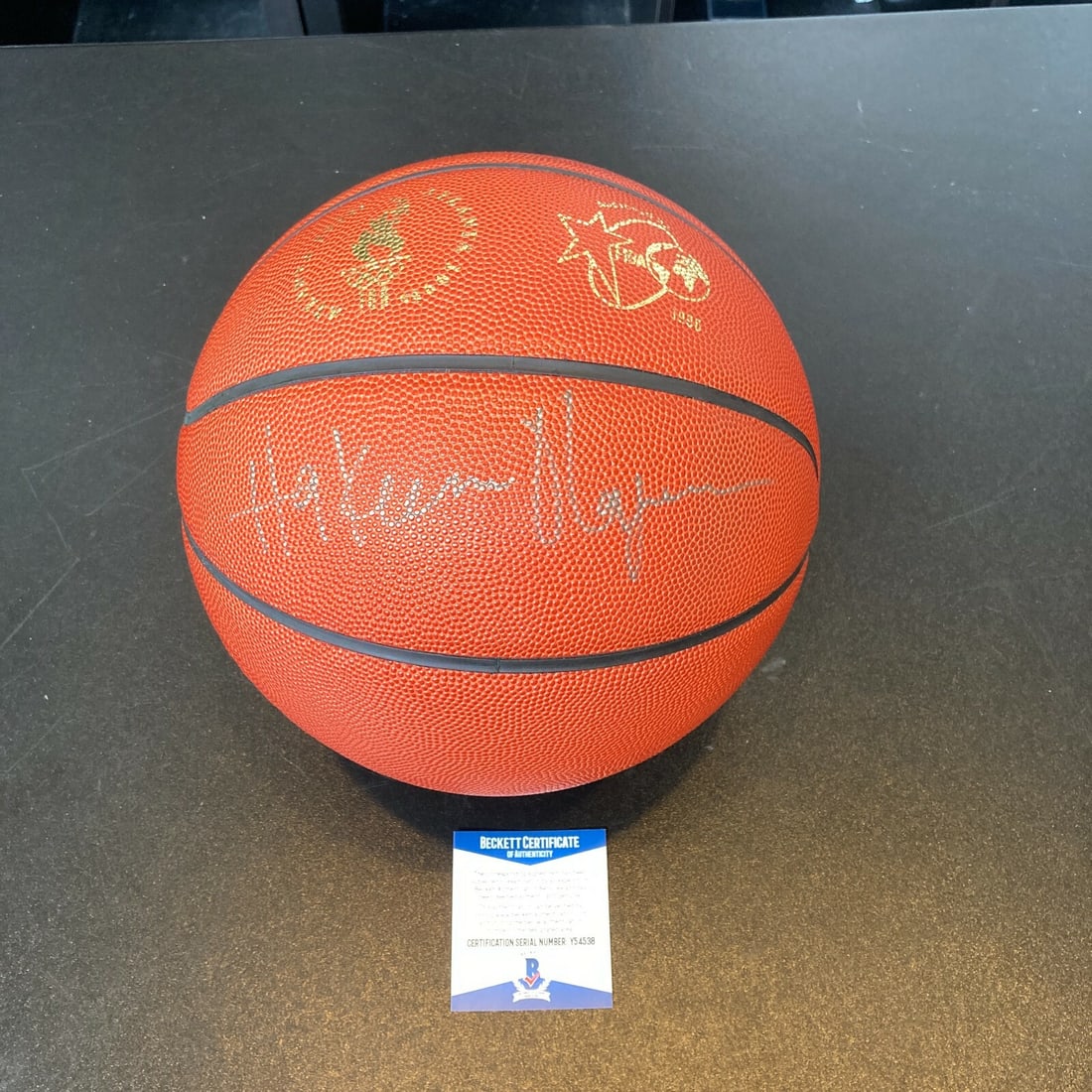 Hakeem Olajuwon Signed 1996 Olympics Basketball Beckett COA: Hakeem Olajuwon Signed 1996 Olympics Basketball Beckett COA This is an official 1996 Olympics game basketball, personally signed by Hakeem Olajuwon, a legendary NBA player. The ball comes with a Becke
