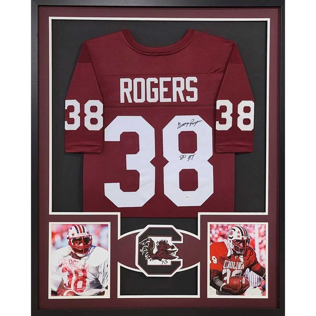 George Rogers Signed Framed Jersey JSA Authenticated South Carolina Heisman: George Rogers Signed Framed Jersey JSA Authenticated South Carolina Heisman This is a framed jersey autographed by George Rogers, the South Carolina Heisman Trophy winner. Authenticated by JSA, a lead