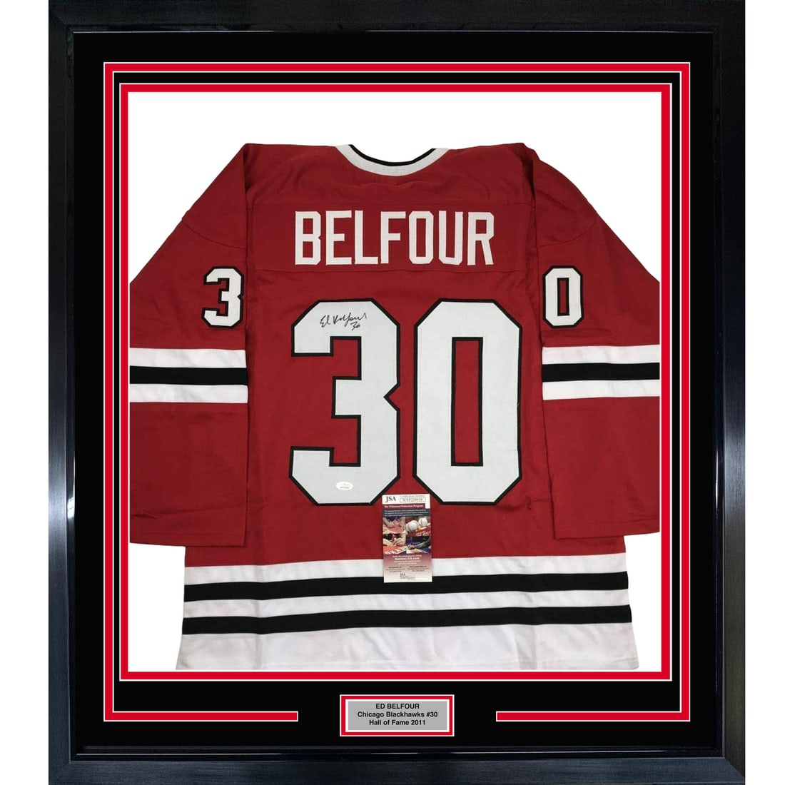 Framed Ed Belfour Autographed Chicago Blackhawks Jersey with JSA COA: Framed Ed Belfour Autographed Chicago Blackhawks Jersey with JSA COA Celebrate your love for the Chicago Blackhawks with this stunning framed autographed Ed Belfour hockey jersey. This original jersey