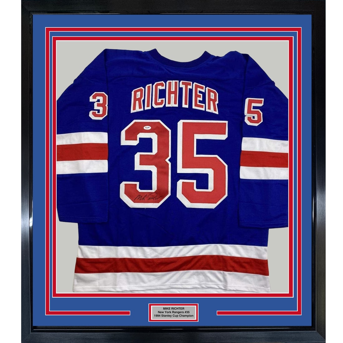 Framed Autographed Mike Richter Jersey New York Rangers PSA/DNA COA 33x42: Framed Autographed Mike Richter Jersey New York Rangers PSA/DNA COA 33x42 Celebrate the legacy of hockey with this professionally framed autographed jersey of Mike Richter, a legendary player for the 