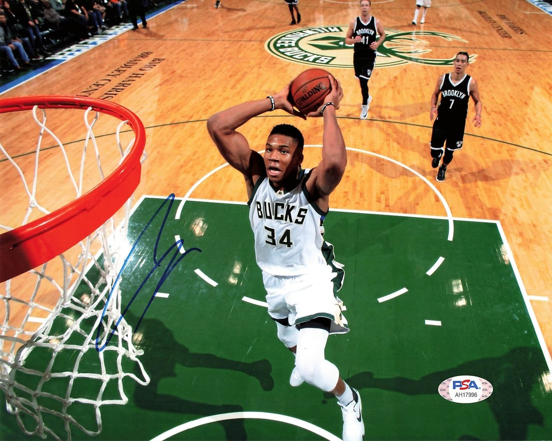 Giannis Antetokounmpo Signed 8x10 Photo PSA/DNA Milwaukee Bucks: Giannis Antetokounmpo Signed 8x10 Photo PSA/DNA Milwaukee Bucks This is an original 8x10 photograph featuring Giannis Antetokounmpo, the star player of the Milwaukee Bucks, with a genuine autograph. T