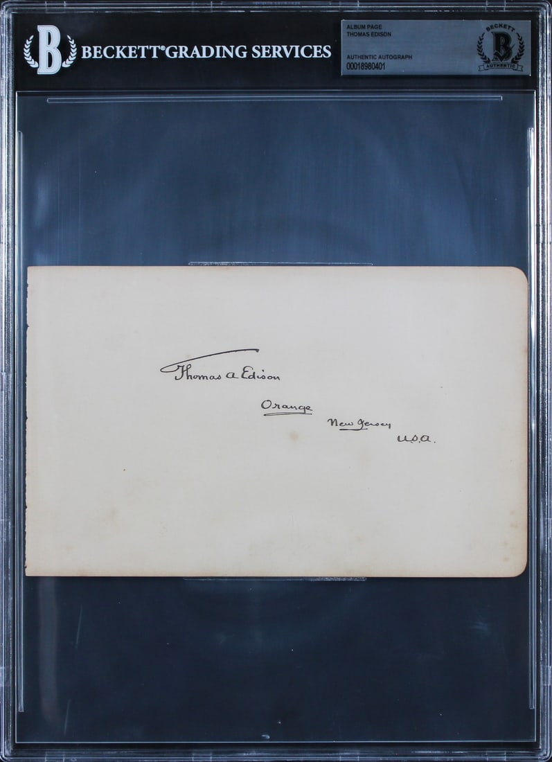 Thomas Edison Signed Album Page Orange New Jersey BAS Slabbed: Thomas Edison Signed Album Page Orange New Jersey BAS Slabbed This is an authentic autographed 5x8 album page personally signed by Thomas Edison, featuring the inscription "Orange New Jersey U.S.A." T