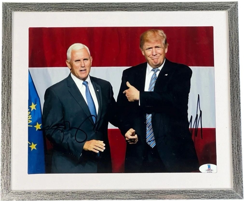 Framed 8x10 Photo Signed by Donald Trump and Mike Pence Beckett: Framed 8x10 Photo Signed by Donald Trump and Mike Pence Beckett Framed color 8x10 photograph signed by Donald Trump and Mike Pence in bold ink. The image features the two against a patriotic backdrop.
