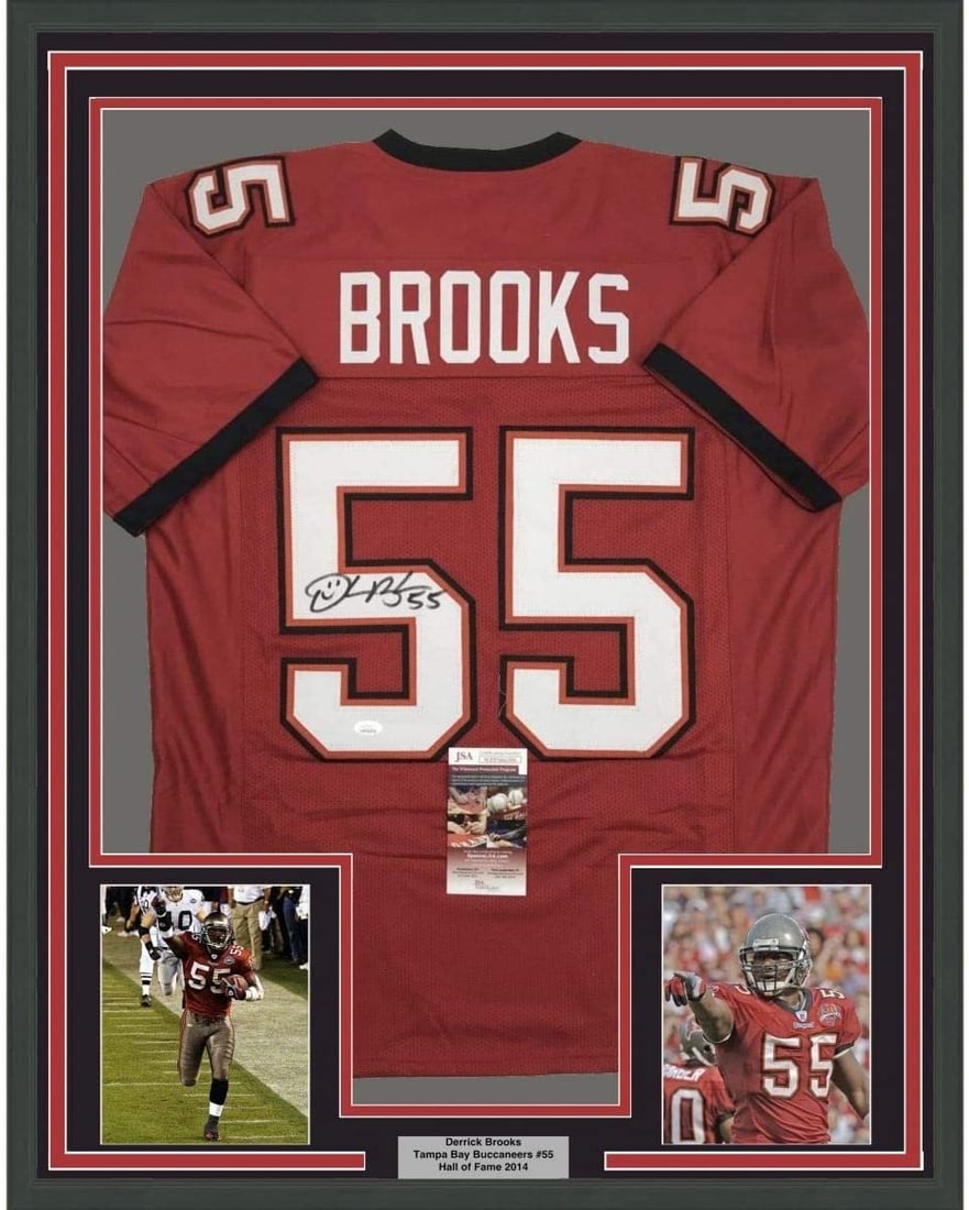 Derrick Brooks signed framed Tampa Bay Buccaneers jersey 35x39 JSA: Derrick Brooks signed framed Tampa Bay Buccaneers jersey 35x39 JSA Professionally framed and matted original red Tampa Bay Buccaneers jersey signed by Derrick Brooks. This pre-owned display includes t