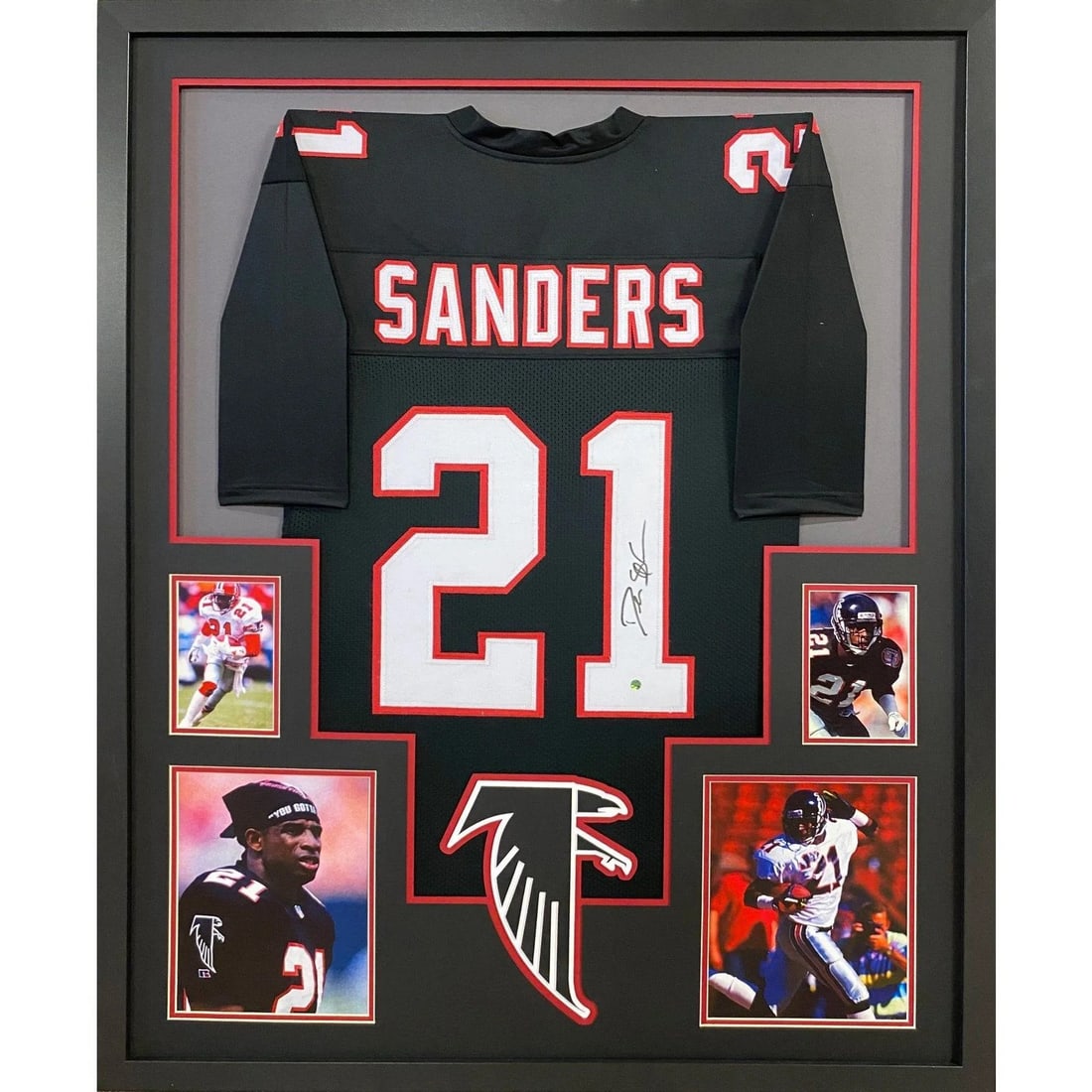 Framed Deion Sanders Signed Falcons Throwback Jersey Beckett Authenticated: Framed Deion Sanders Signed Falcons Throwback Jersey Beckett Authenticated Pre-owned framed throwback Falcons jersey autographed by Deion Sanders. The autograph is authenticated by Beckett and the pie