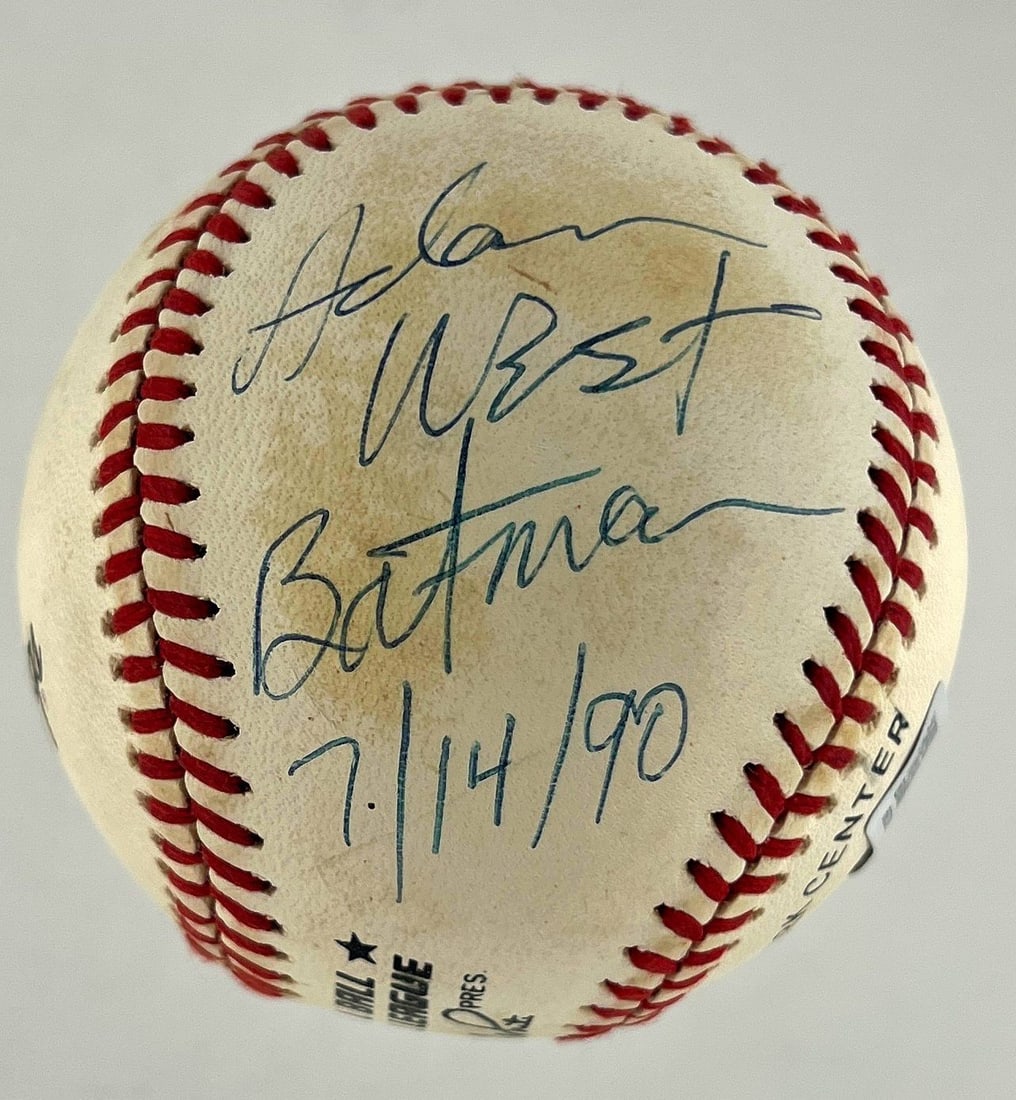 Beckett Authenticated Baseball Signed by Adam West and Burt Ward: Beckett Authenticated Baseball Signed by Adam West and Burt Ward Original baseball signed by Adam West and Burt Ward, with Adam West adding the date "7/14/90." The autograph has been authenticated by 
