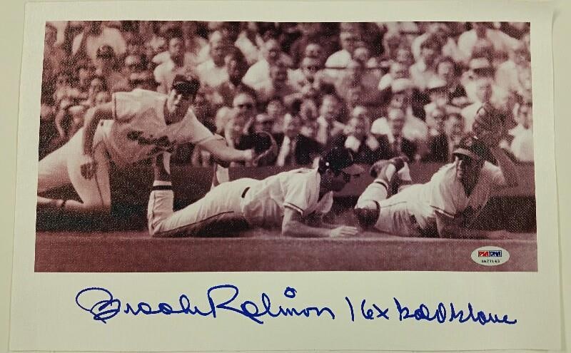 PSA DNA Brooks Robinson Signed Orioles HOF Photo 16x Gold Glove 9x14: PSA DNA Brooks Robinson Signed Orioles HOF Photo 16x Gold Glove 9x14 Original signed Brooks Robinson baseball photo canvas featuring the inscription "16x Gold Glove." This pre-owned collectible relate