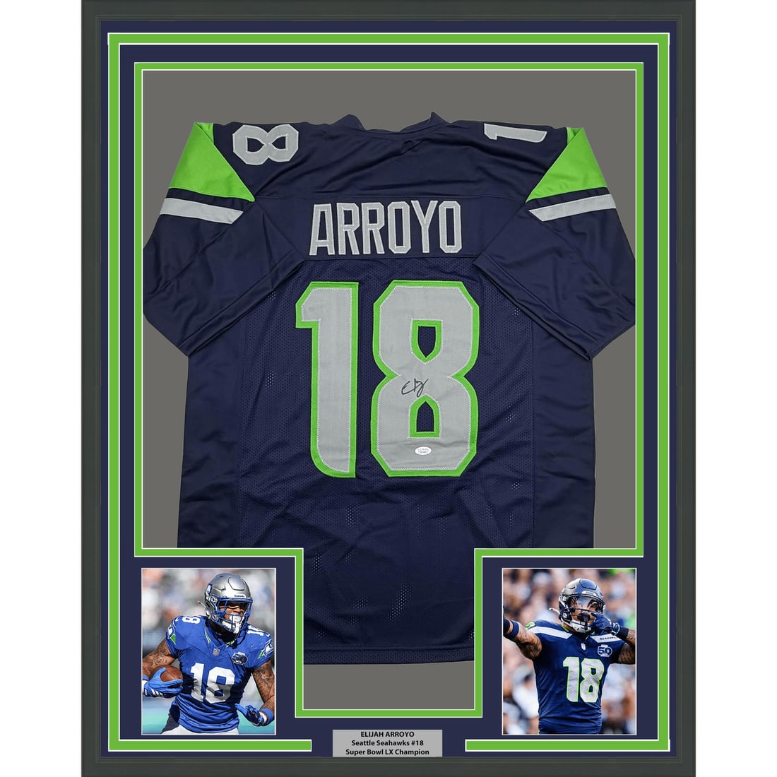 Elijah Arroyo signed framed Seattle Seahawks football jersey 35x39: Elijah Arroyo signed framed Seattle Seahawks football jersey 35x39 Professionally framed autographed Seattle navy blue football jersey signed by Elijah Arroyo. The display is matted with two 5x7 photo