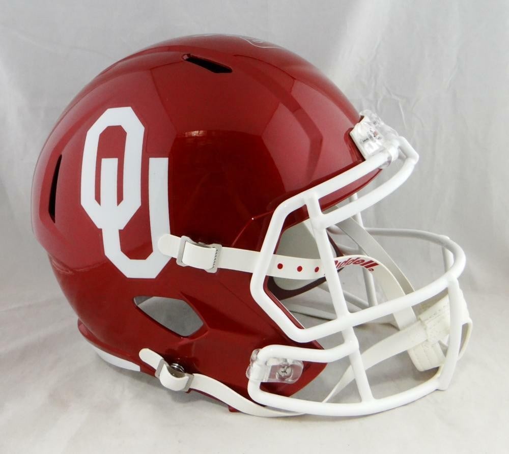 Adrian Peterson autographed Oklahoma Riddell Speed football helmet Beckett Wit Silver Top: Adrian Peterson autographed Oklahoma Riddell Speed football helmet Beckett Wit Silver Top This is an original full-size Riddell Speed helmet featuring the Oklahoma team design, signed by Adrian Peters