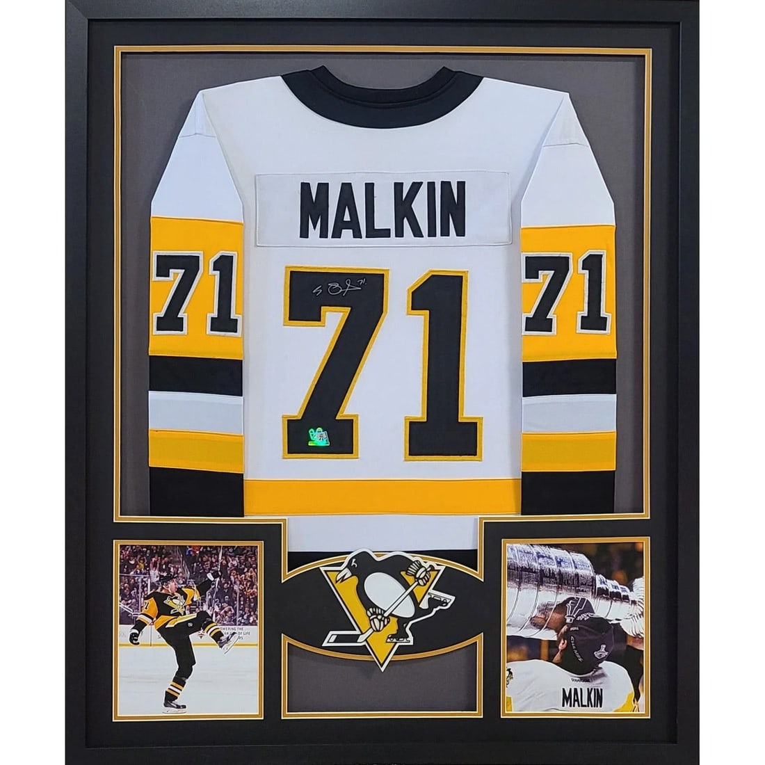 Evgeni Malkin Signed Jersey Framed Pittsburgh Penguins COA: Evgeni Malkin Signed Jersey Framed Pittsburgh Penguins COA This autographed Evgeni Malkin framed jersey is a must-have for any Pittsburgh Penguins fan. The jersey is authenticated by Malkin himself an
