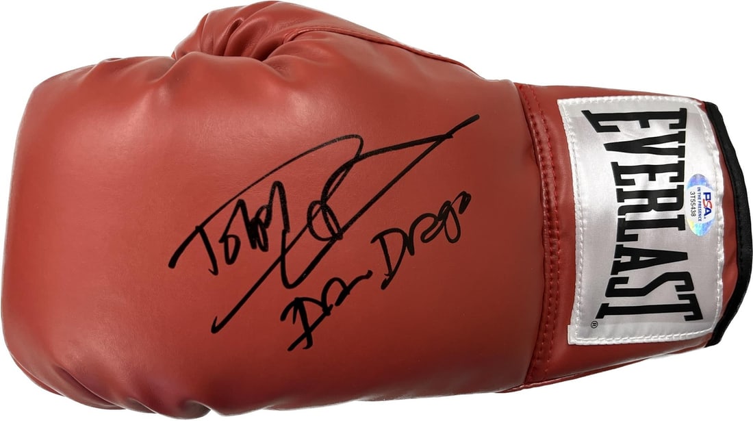 Dolph Lundgren Signed Boxing Glove PSA/DNA Ivan Drago Rocky IV: Dolph Lundgren Signed Boxing Glove PSA/DNA Ivan Drago Rocky IV This is an original boxing glove signed by actor Dolph Lundgren, famously known for his role as Ivan Drago in the film Rocky IV. The auto