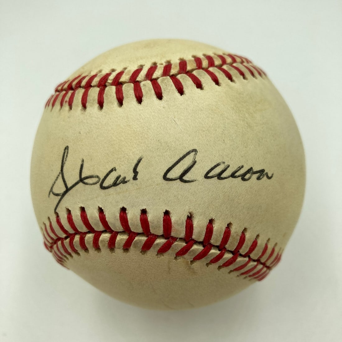 Hank Aaron Autographed National League Baseball With PSA DNA Authentication: Hank Aaron Autographed National League Baseball With PSA DNA Authentication This is an official National League baseball signed by legendary player Hank Aaron. The ball has been authenticated by Profe