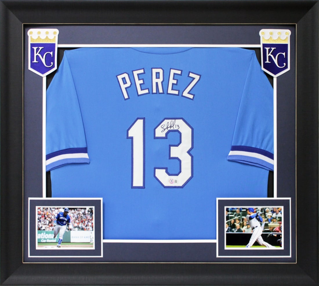 Framed Light Blue Jersey Signed by Salvador Perez Beckett Witnessed: Framed Light Blue Jersey Signed by Salvador Perez Beckett Witnessed Authentic framed light blue pro style jersey personally signed by Salvador Perez of the Kansas City Royals. This original autograph 
