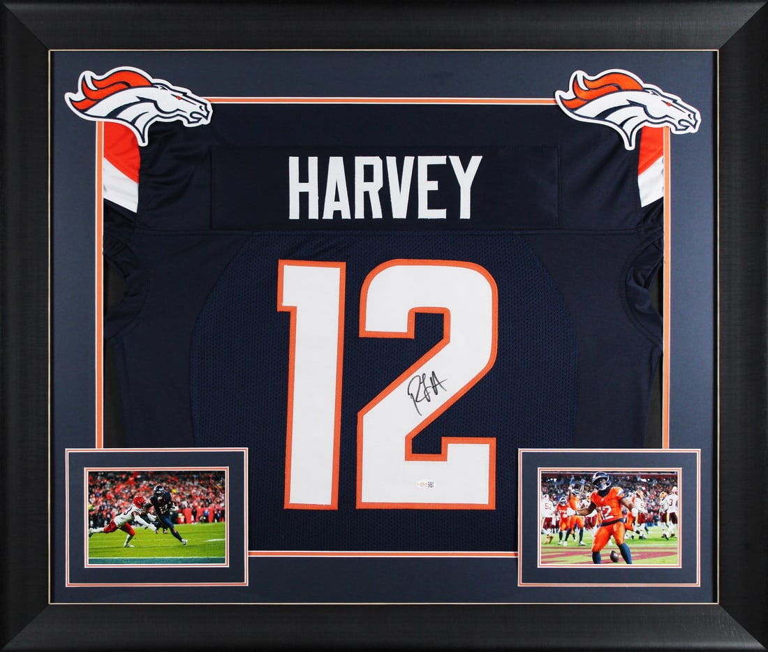 Framed Denver Broncos jersey signed by R.J. Harvey JSA witnessed: Framed Denver Broncos jersey signed by R.J. Harvey JSA witnessed This professionally framed navy Procut style jersey has been personally autographed by R.J. Harvey of the Denver Broncos. The jersey is