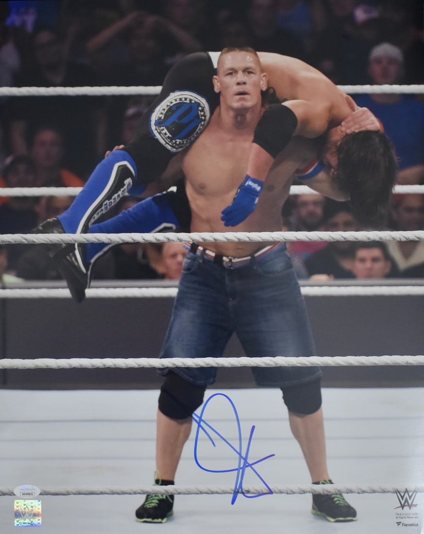 WWE WWF John Cena autographed original 16x20 photo JSA 212507: WWE WWF John Cena autographed original 16x20 photo JSA 212507 Original John Cena signed 16x20 photo featuring WWE/WWF. This pre-owned photo is offered as an autographed collectible from the United Sta