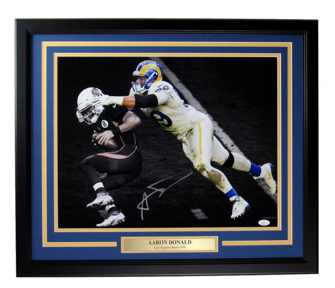 Framed 16x20 Photo Signed by Aaron Donald JSA Certified Los Angeles Rams: Framed 16x20 Photo Signed by Aaron Donald JSA Certified Los Angeles Rams This professionally framed 16x20 photo features an authentic autograph from Aaron Donald during his time with the Los Angeles R