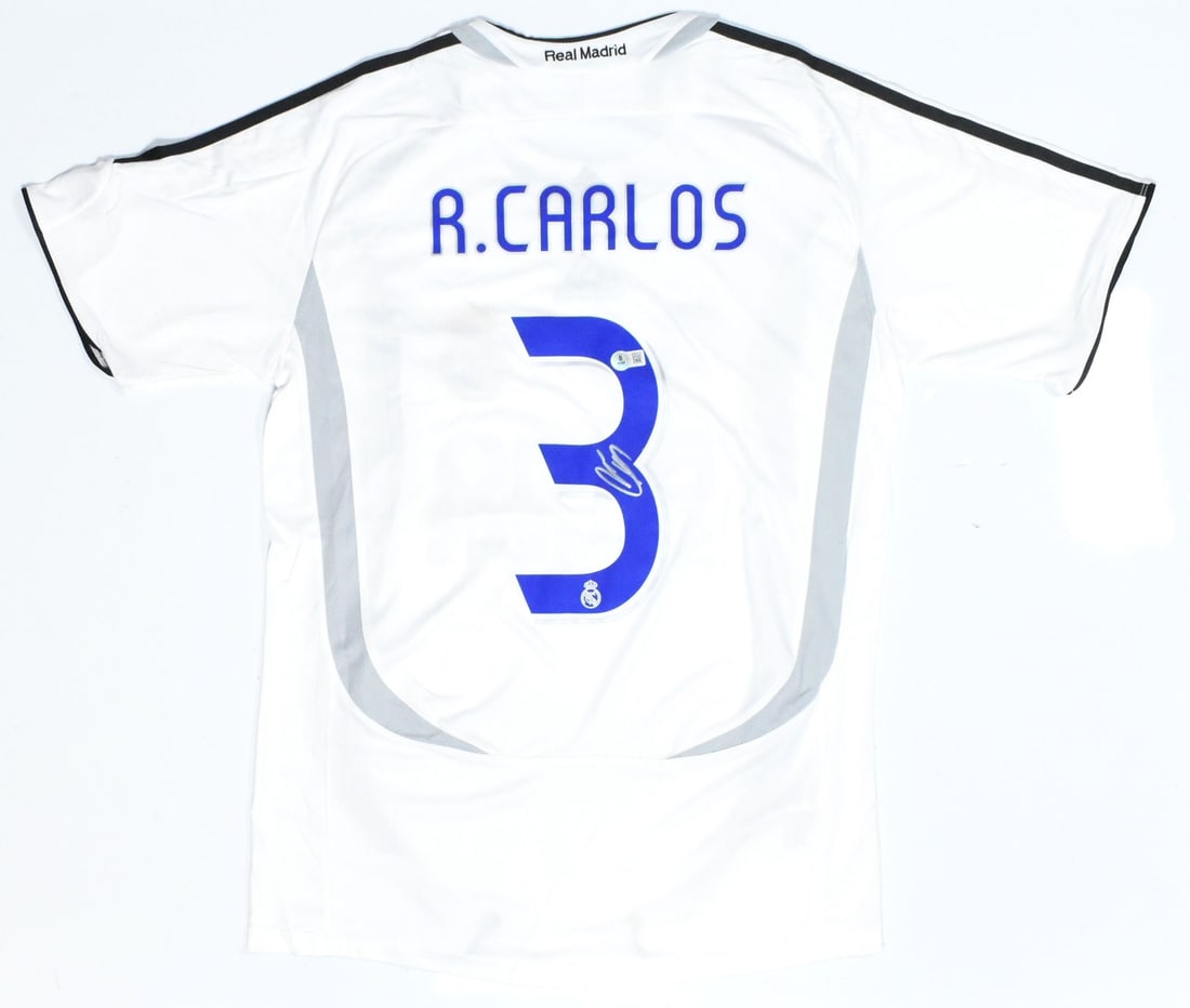 Roberto Carlos signed Real Madrid home jersey Beckett hologram #3: Roberto Carlos signed Real Madrid home jersey Beckett hologram #3 This is an original Real Madrid home soccer jersey, autographed by Roberto Carlos and featuring his number 3. The jersey is pre-owned 