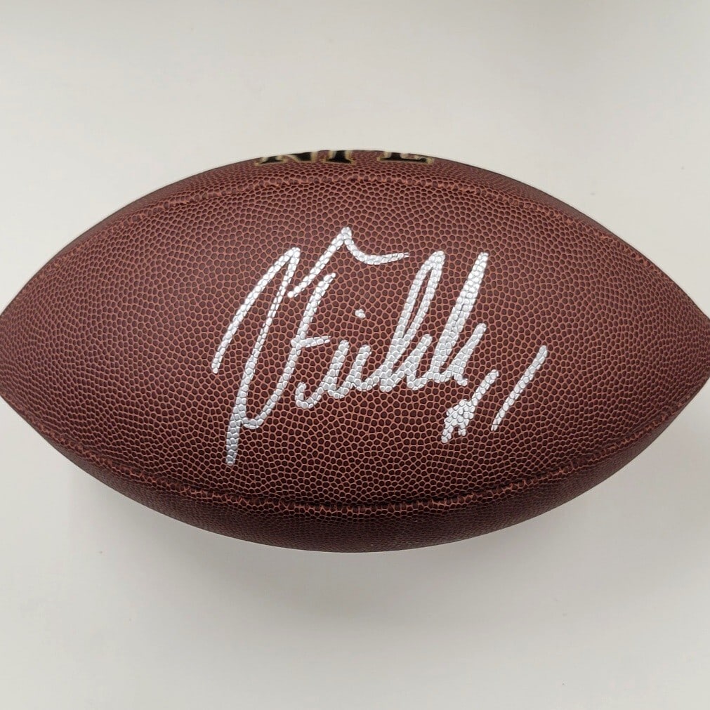 Justin Fields Signed Wilson NFL Football Pittsburgh Steelers Beckett Authenticated: Justin Fields Signed Wilson NFL Football Pittsburgh Steelers Beckett Authenticated This is an original Wilson Super NFL Football signed by Justin Fields, a prominent player in the sport. The ball feat