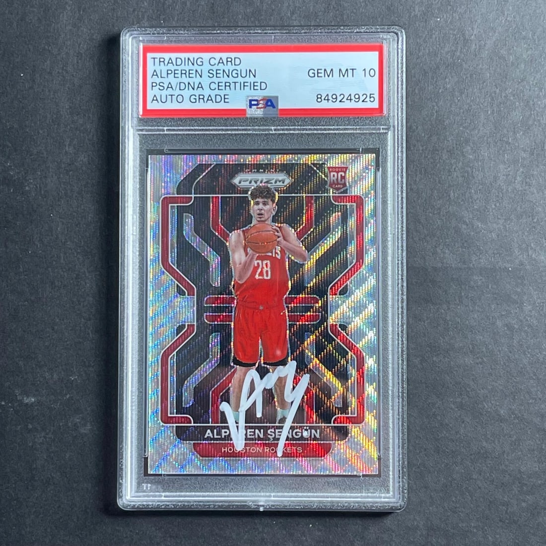 2021-22 Panini Prizm Silver Wave Alperen Sengun Auto PSA 10: 2021-22 Panini Prizm Silver Wave Alperen Sengun Auto PSA 10 This is a 2021-22 Panini Prizm Silver Wave #318 autographed trading card featuring Alperen Sengun of the Houston Rockets. The card has been 