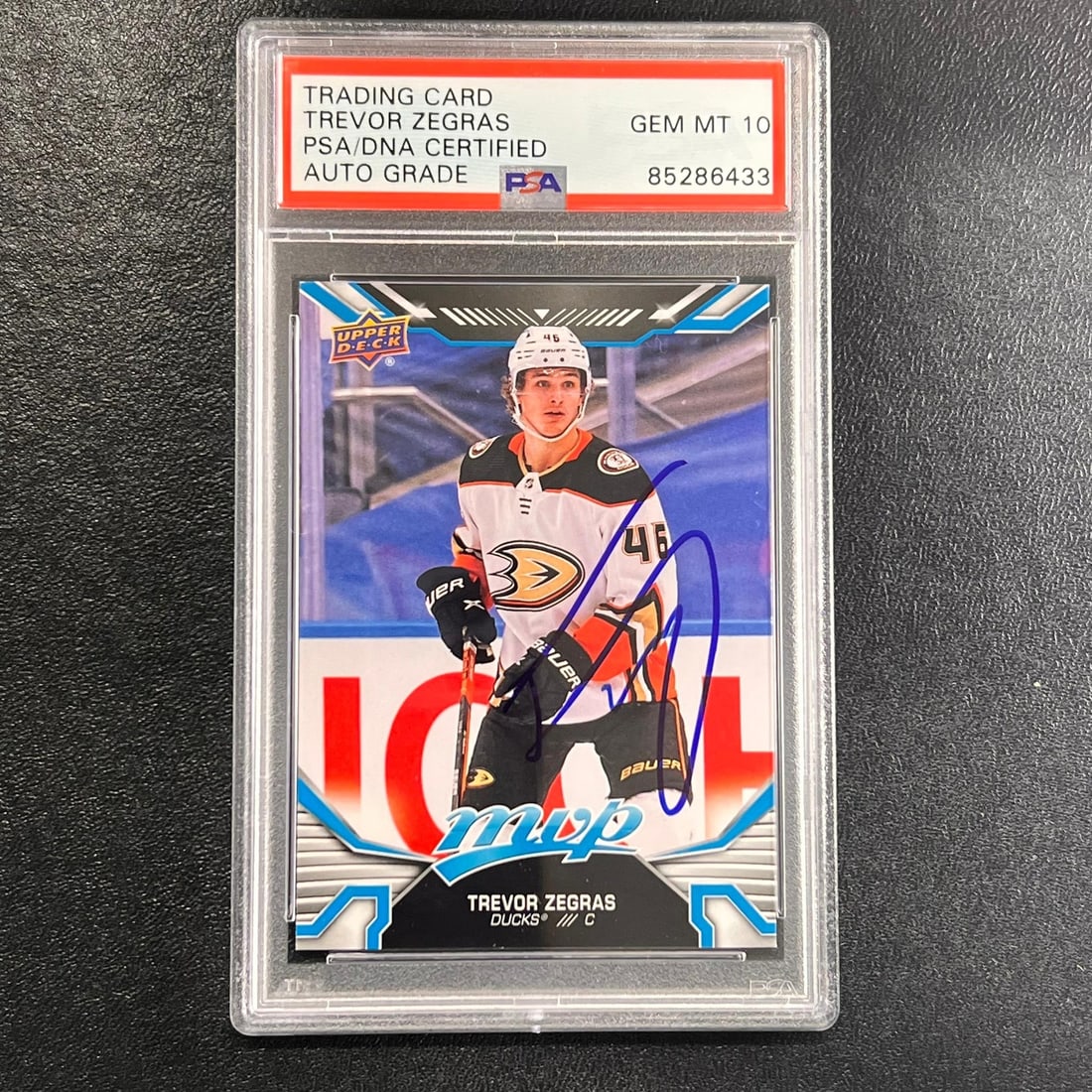 2022-23 Upper Deck MVP Trevor Zegras Signed Card PSA 10: 2022-23 Upper Deck MVP Trevor Zegras Signed Card PSA 10 Presenting the 2022-23 Upper Deck MVP Hockey #199 signed card featuring Trevor Zegras. This standard-sized sports trading card is part of the