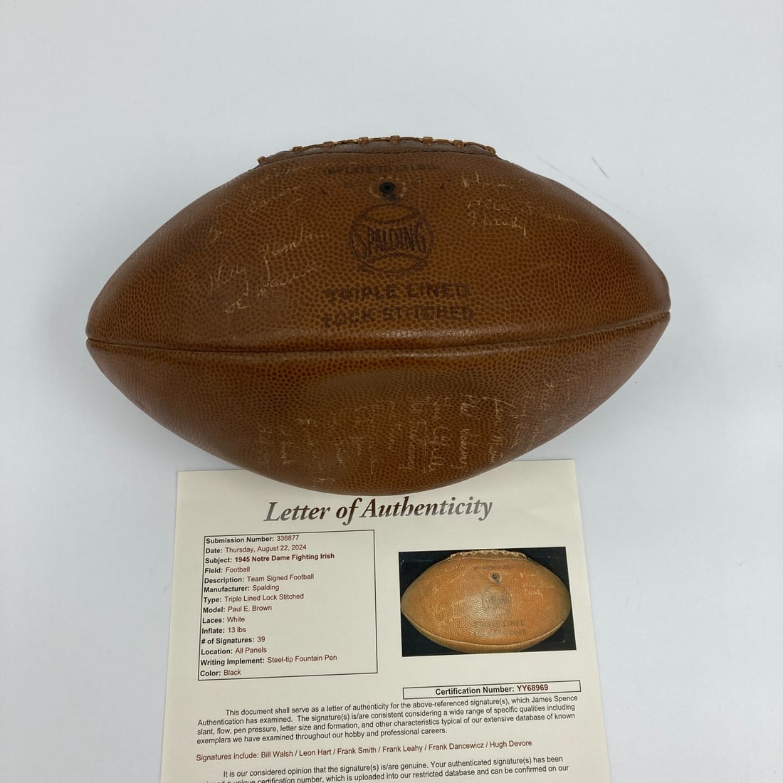 1945 Notre Dame Fighting Irish Signed Spalding Football with JSA COA: 1945 Notre Dame Fighting Irish Signed Spalding Football with JSA COA This is an authentic 1945 Notre Dame Fighting Irish Team Signed Spalding Paul Brown Football that features the signatures of over 3