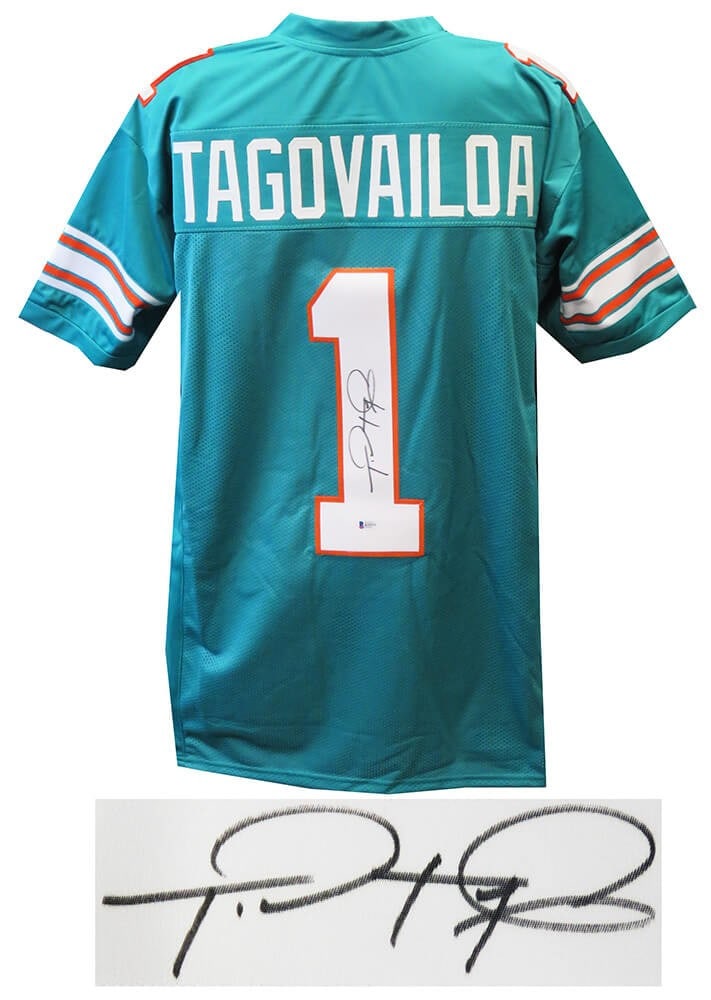 Tua Tagovailoa Signed Miami Dolphins Teal Football Jersey Beckett COA: Tua Tagovailoa Signed Miami Dolphins Teal Football Jersey Beckett COA Celebrate your passion for football with this authentic teal custom football jersey signed by Tua Tagovailoa of the Miami Dolphins