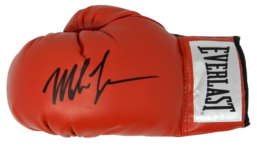 Everlast red full size boxing glove autographed by Mike Tyson with COA: Everlast red full size boxing glove autographed by Mike Tyson with COA Original Mike Tyson signed Everlast red full size boxing glove. This pre-owned boxing collectible is accompanied by a tamper-proo