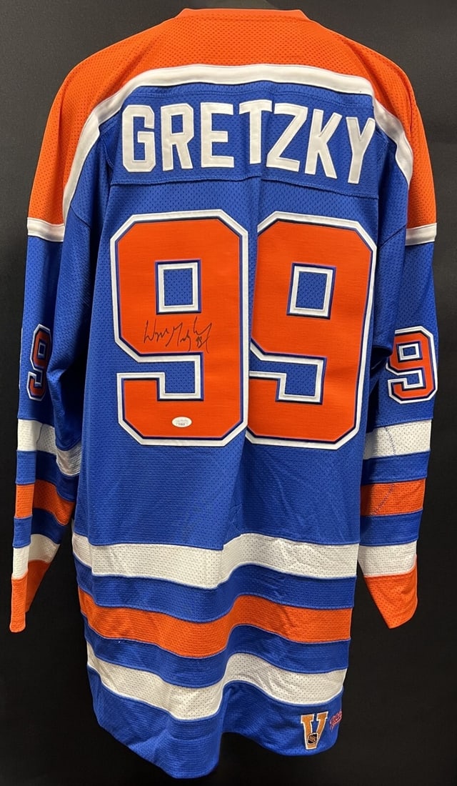 Wayne Gretzky Signed Edmonton Oilers Jersey with JSA COA: Wayne Gretzky Signed Edmonton Oilers Jersey with JSA COA Celebrate the legacy of hockey legend Wayne Gretzky with this authentic Mitchell & Ness Edmonton Oilers jersey. This pre-owned jersey features 