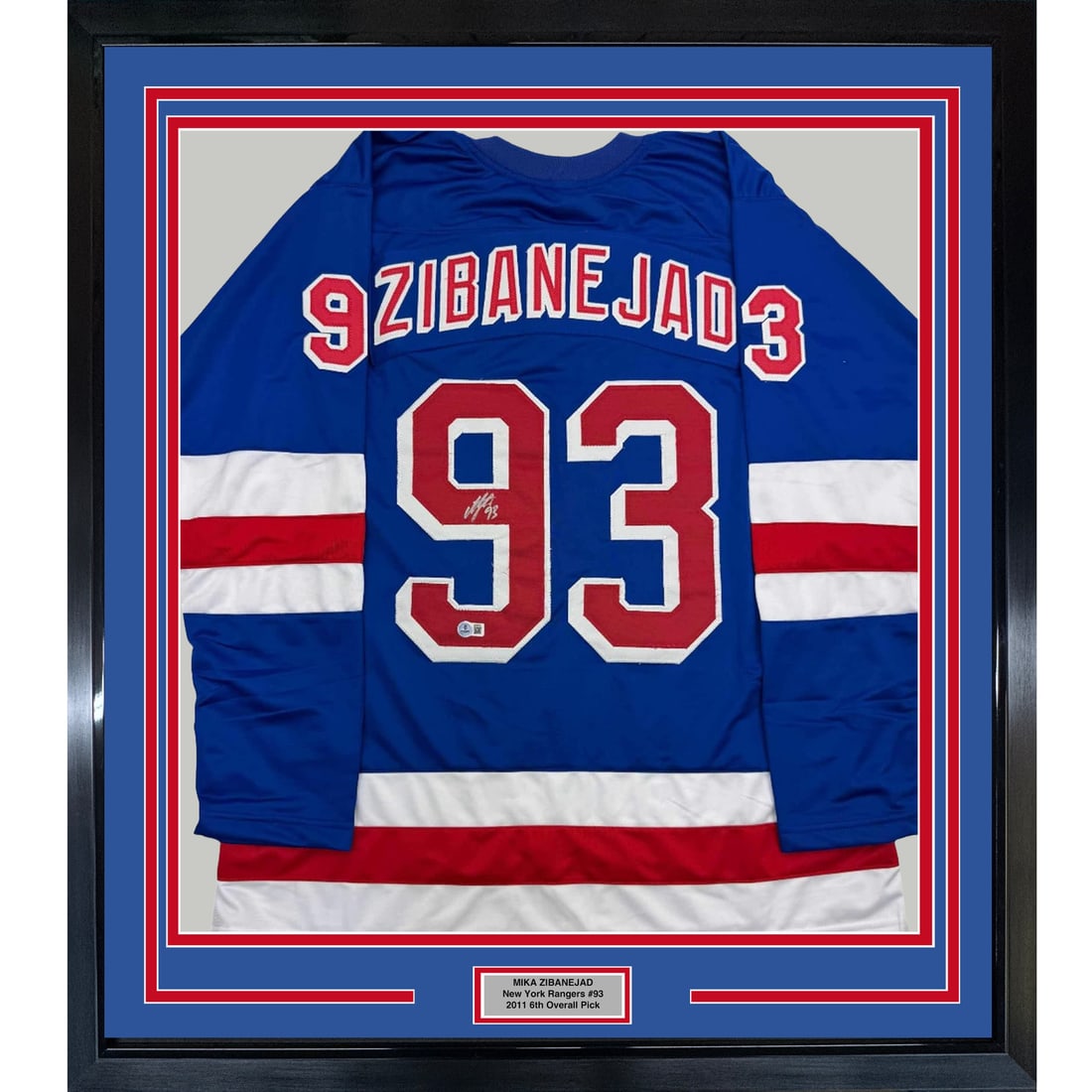 Framed Mika Zibanejad Autographed Jersey New York Rangers Beckett COA 35x39: Framed Mika Zibanejad Autographed Jersey New York Rangers Beckett COA 35x39 This framed, autographed New York Rangers jersey features the signature of star athlete Mika Zibanejad, authenticated by Bec