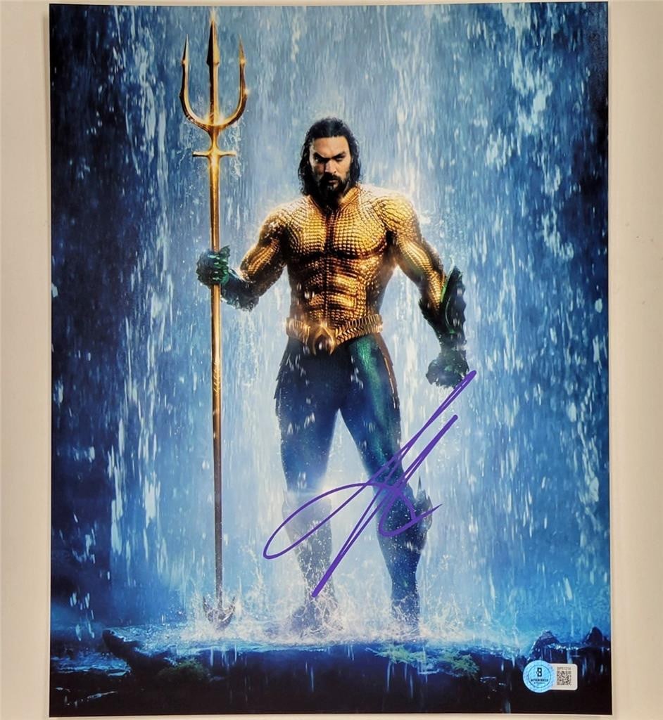 11x14 Jason Momoa Autographed Aquaman Photo with Beckett Authentication: 11x14 Jason Momoa Autographed Aquaman Photo with Beckett Authentication This original 11x14 photograph features an autograph by Jason Momoa from Aquaman, authenticated by Beckett. The item is pre-owne
