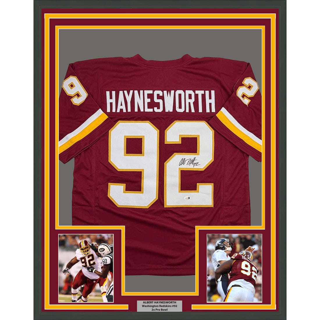 Albert Haynesworth Autographed Framed Washington Maroon Football Jersey JSA: Albert Haynesworth Autographed Framed Washington Maroon Football Jersey JSA Professionally framed and matted maroon football jersey signed by Albert Haynesworth. This original autographed piece includ