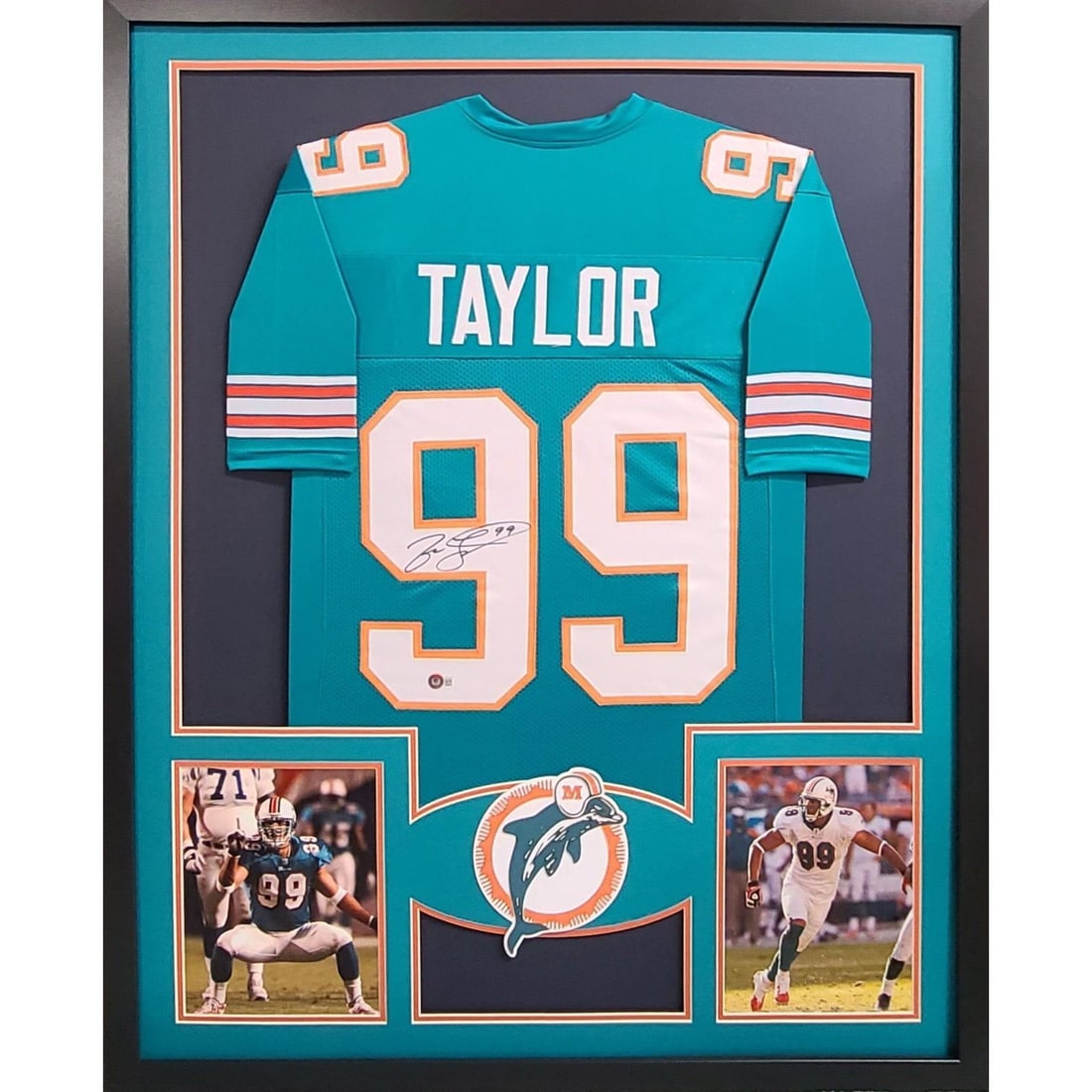 Framed Miami Dolphins Jason Taylor Autograph Jersey Beckett Authenticated: Framed Miami Dolphins Jason Taylor Autograph Jersey Beckett Authenticated This is an original Miami Dolphins jersey autographed by Jason Taylor, professionally framed and authenticated by Beckett. The