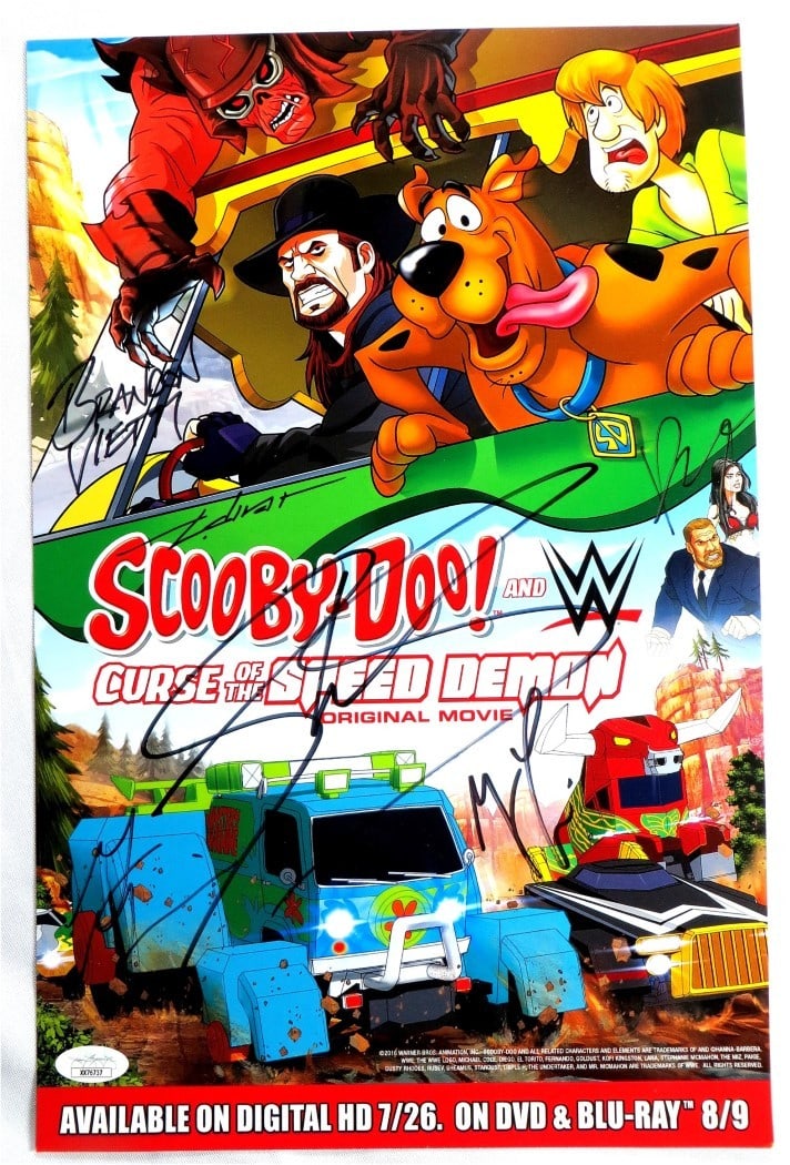 Scooby-Doo WWE Speed Demon Autographed 10x15 Poster 6 Signatures JSA: Scooby-Doo WWE Speed Demon Autographed 10x15 Poster 6 Signatures JSA This is an original Scooby-Doo! WWE Speed Demon poster measuring approximately 10" x 15". It features the signatures of notable per