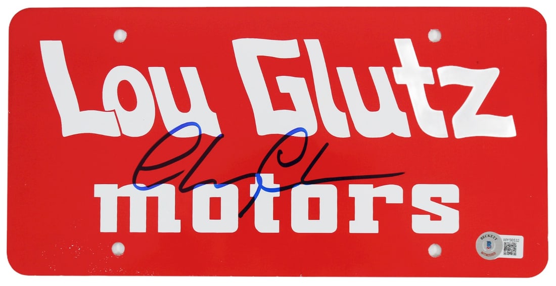 Chevy Chase Signed Lou Glutz Motors License Plate BAS Authenticated: Chevy Chase Signed Lou Glutz Motors License Plate BAS Authenticated This authentic Lou Glutz Motors license plate is personally signed by Chevy Chase, renowned for his role in National Lampoon's Vacat