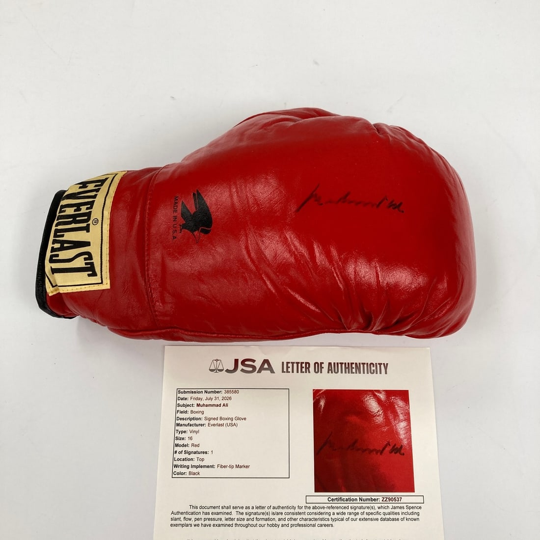Everlast Boxing Glove Autographed by Muhammad Ali with JSA Letter: Everlast Boxing Glove Autographed by Muhammad Ali with JSA Letter Pre-owned Everlast boxing glove signed by Muhammad Ali. This original autographed piece includes James Spence Authentication (JSA) wit
