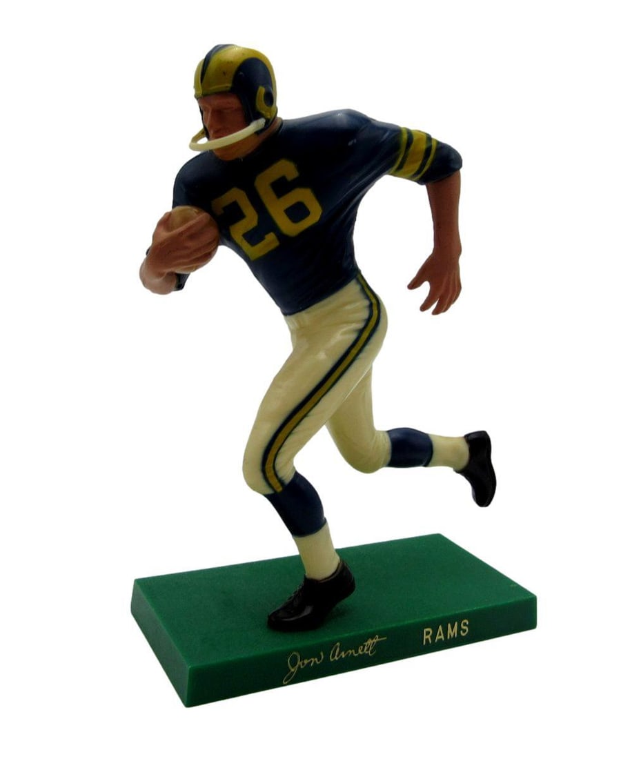 Vintage Jon Arnett 1962 Hartland 7in Rams Football Statue: Vintage Jon Arnett 1962 Hartland 7in Rams Football Statue This vintage Jon Arnett Los Angeles Rams football statue is a collectible piece from 1962, crafted from plastic. Standing at 7 inches, it show