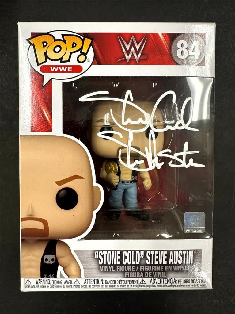 Stone Cold Steve Austin WWE Funko Pop Signed with Beckett BAS: Stone Cold Steve Austin WWE Funko Pop Signed with Beckett BAS This Funko Pop figure features the iconic Stone Cold Steve Austin, a legendary figure in WWE wrestling. The collectible comes with a