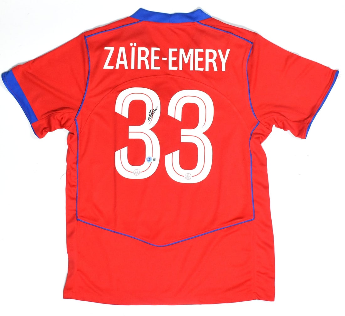 PSG Red Third Jersey Autographed by Warren Zaire-Emery Beckett Holo: PSG Red Third Jersey Autographed by Warren Zaire-Emery Beckett Holo This PSG red third soccer jersey is autographed by Warren Zaire-Emery and features his number 33. The jersey is an original item and