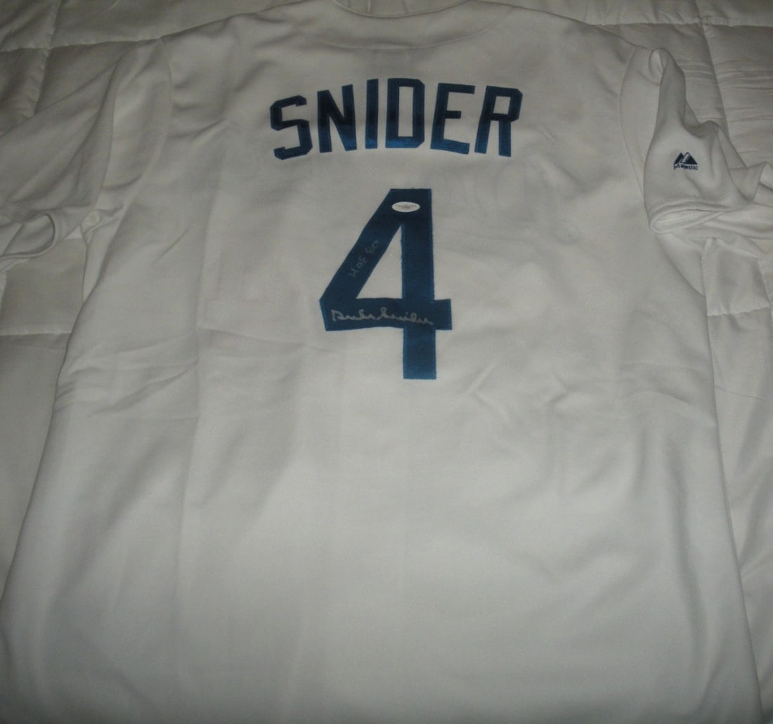 Official Majestic Brooklyn Dodgers Jersey signed by Duke Snider JSA COA: Official Majestic Brooklyn Dodgers Jersey signed by Duke Snider JSA COA Official licensed Majestic Brooklyn Dodgers jersey signed by Duke Snider. This original baseball collectible is pre-owned and co