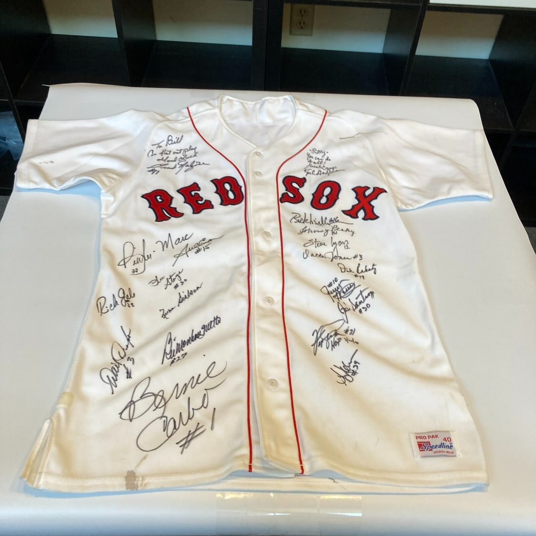 Boston Red Sox Vintage Jersey Signed by Multiple 1960s-1970s Team Legends: Boston Red Sox Vintage Jersey Signed by Multiple 1960s-1970s Team Legends This vintage Boston Red Sox jersey from the 1960s-1970s features multiple signatures from team legends. An original piece, it 