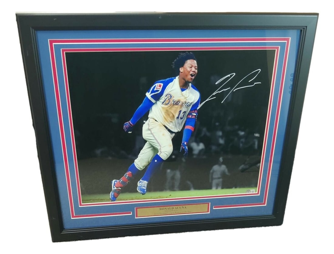 Framed Ronald Acuna signed 16x20 Braves photo BAS authenticated: Framed Ronald Acuna signed 16x20 Braves photo BAS authenticated This framed 16x20 photograph features the autograph of Ronald Acuna, a prominent player for the Atlanta Braves. The signature has been a