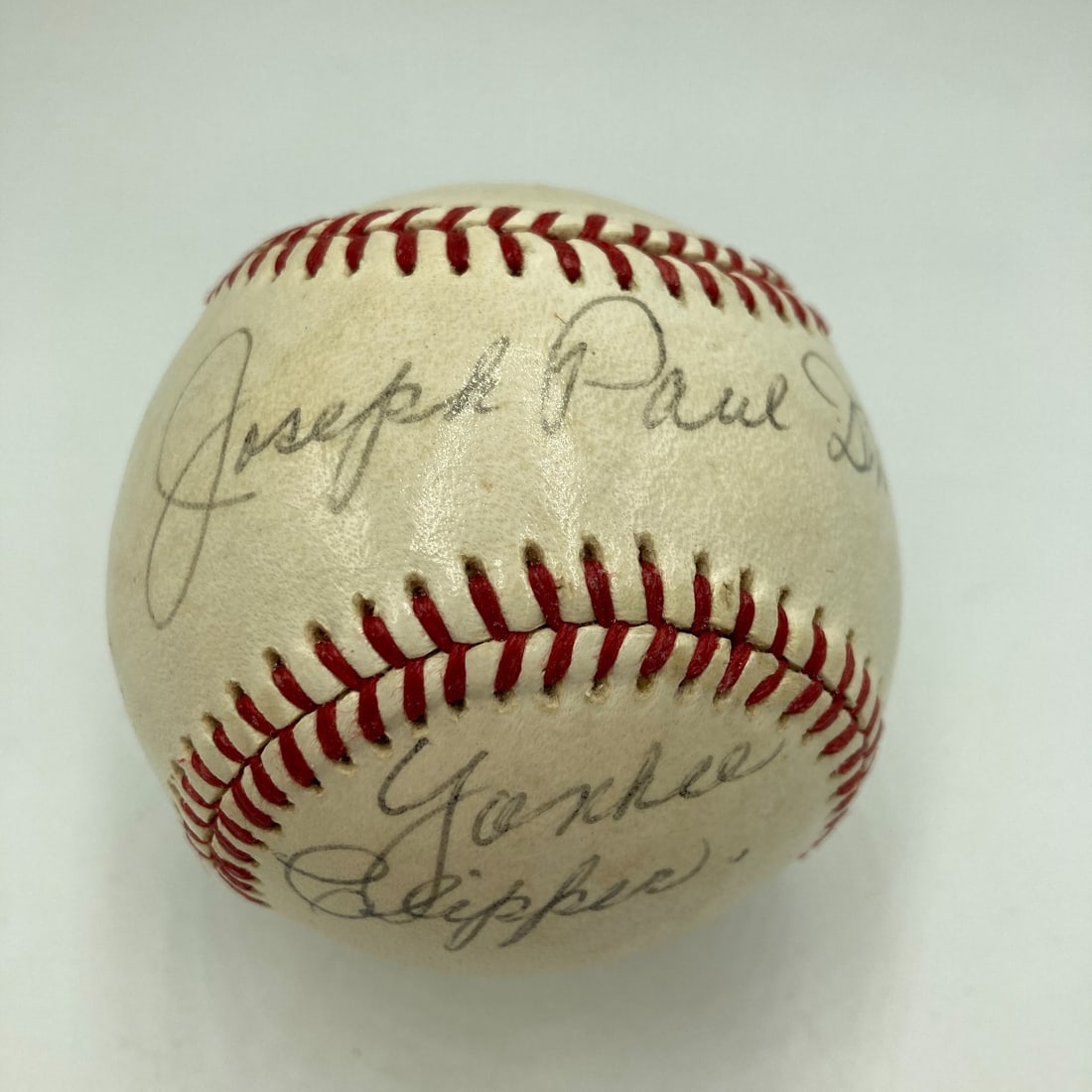 Baseball Signed With Full Name And Yankee Clipper Inscription PSA Authenticated: Baseball Signed With Full Name And Yankee Clipper Inscription PSA Authenticated This Rawlings Official American League (MacPhail) baseball features the rare full-name signature of Joe DiMaggio, inscri