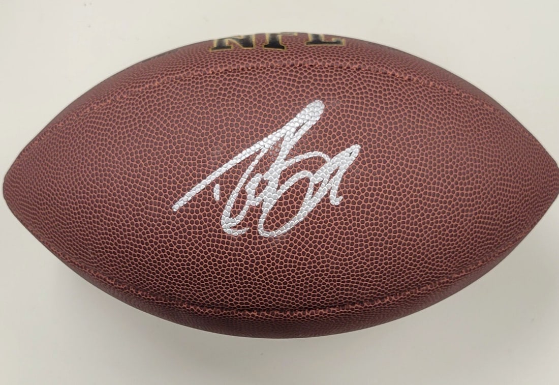 Beckett authenticated Drew Brees Wilson replica Saints signed football: Beckett authenticated Drew Brees Wilson replica Saints signed football This Wilson replica NFL football features the autograph of Drew Brees, the renowned quarterback for the New Orleans Saints. The s