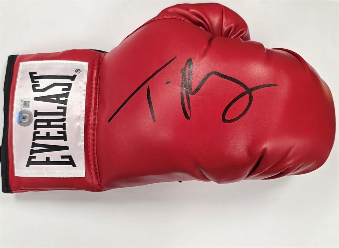Beckett BAS Tyson Fury autographed Everlast red boxing glove: Beckett BAS Tyson Fury autographed Everlast red boxing glove Signed Tyson Fury Everlast boxing glove with Beckett Authentication Services (BAS) authentication. This original boxing collectible is a pr