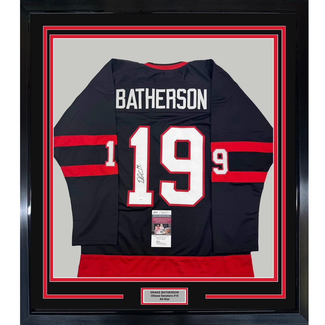 Framed Autographed Drake Batherson Ottawa Senators Jersey with JSA COA: Framed Autographed Drake Batherson Ottawa Senators Jersey with JSA COA Showcase your passion for hockey with this professionally framed autographed jersey of Drake Batherson from the Ottawa Senators. 