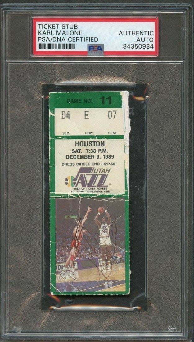Karl Malone Signed Ticket Stub PSA/DNA Utah Jazz Autographed: Karl Malone Signed Ticket Stub PSA/DNA Utah Jazz Autographed This offering features a slabbed ticket stub autographed by NBA legend Karl Malone, known for his remarkable career with the Utah Jazz. The